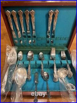 1950's WM Rogers Co. Extra Plate Magnolia 53 Piece Silverware Set in Box 8 Place 1950's WM Rogers Co. Extra Plate Magnolia 53 Piece Silverware Set in Box 8 Place