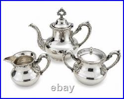Antique American Roger's Special Quadruple Plate Silver-plate Repousse Tea Set