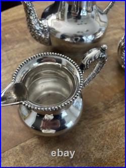 Antique American Roger's Special Quadruple Plate Silver-plate Repousse Tea Set