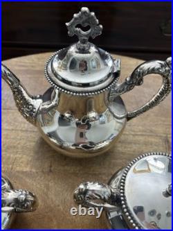 Antique American Roger's Special Quadruple Plate Silver-plate Repousse Tea Set