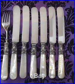 Fancy Wm A Rogers Mother of Pearl Handle 12 Pc Flatware Set withSterling Ferrules