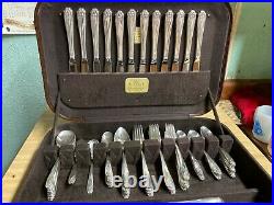Roger Bros. Silverplate 12-14 place flatware Daffodil great cond. With bakelike