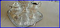 Spring Flowers silver-plated coffee/teapot set by Wm. Rogers & Son & B. M. C. Tray