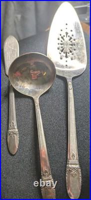 Vintage 1847 Rogers Bros First Love 72-Piece Silverplate Flatware Set Vintage 1847 Rogers Bros First Love 72-Piece Silverplate Flatware Set