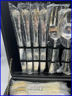 Vintage W. M. Rogers ENCHANTED ROSE silverplated flatware/silverware- 42 Piece