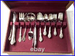 WM A Rogers Deluxe Stainless Oneida LTD 54 Pieces Case Excellent Condition