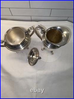 WM Rogers Eagle Star Antique Silverplated Tilting Teapot w Cream Pitcher & Sugar