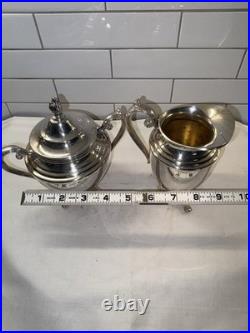 WM Rogers Eagle Star Antique Silverplated Tilting Teapot w Cream Pitcher & Sugar