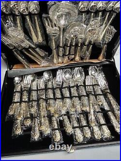 WM Rogers & Son Enchanted Rose-50 Piece Plated Silverware Set Service 12 Gold