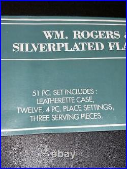 WM Rogers & Son Enchanted Rose Pattern 51 Piece Silverware Plated Set Case NEW